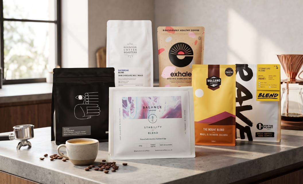 Six coffee brands displayed in a stylish lifestyle coffee scene, with Balance Coffee featured most prominently.