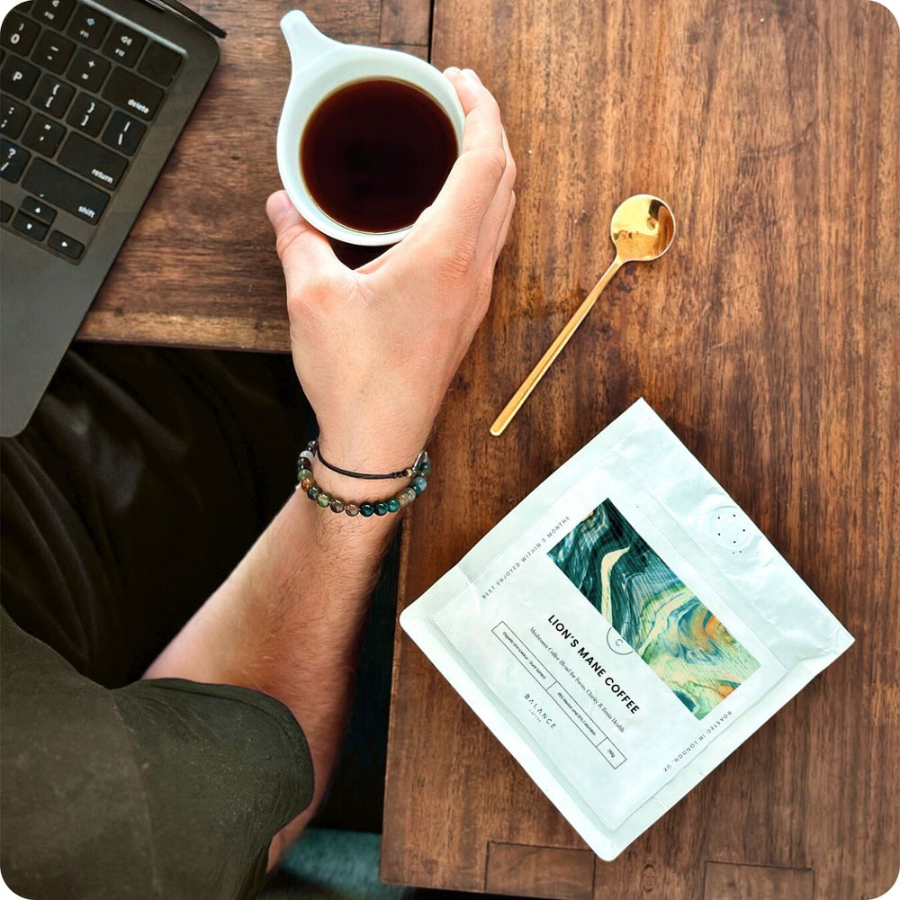 James Drinking Speciality Lion's Mane Coffee