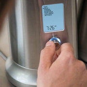 Coffee maker displaying time