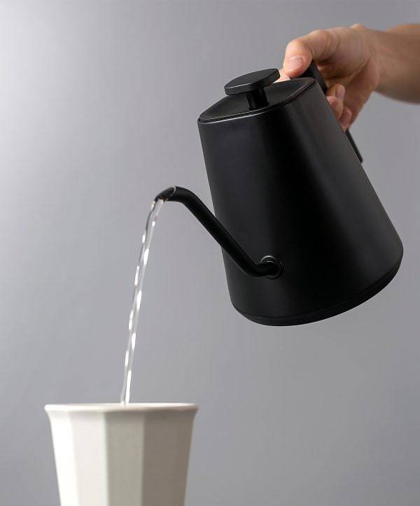 Image of man holding a kettle